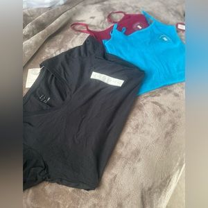 (2) tunic camis and a black shirt